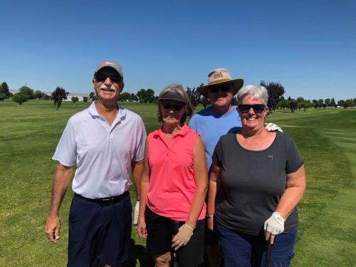 Golfers posing for a photo at during an event at Quincy WA